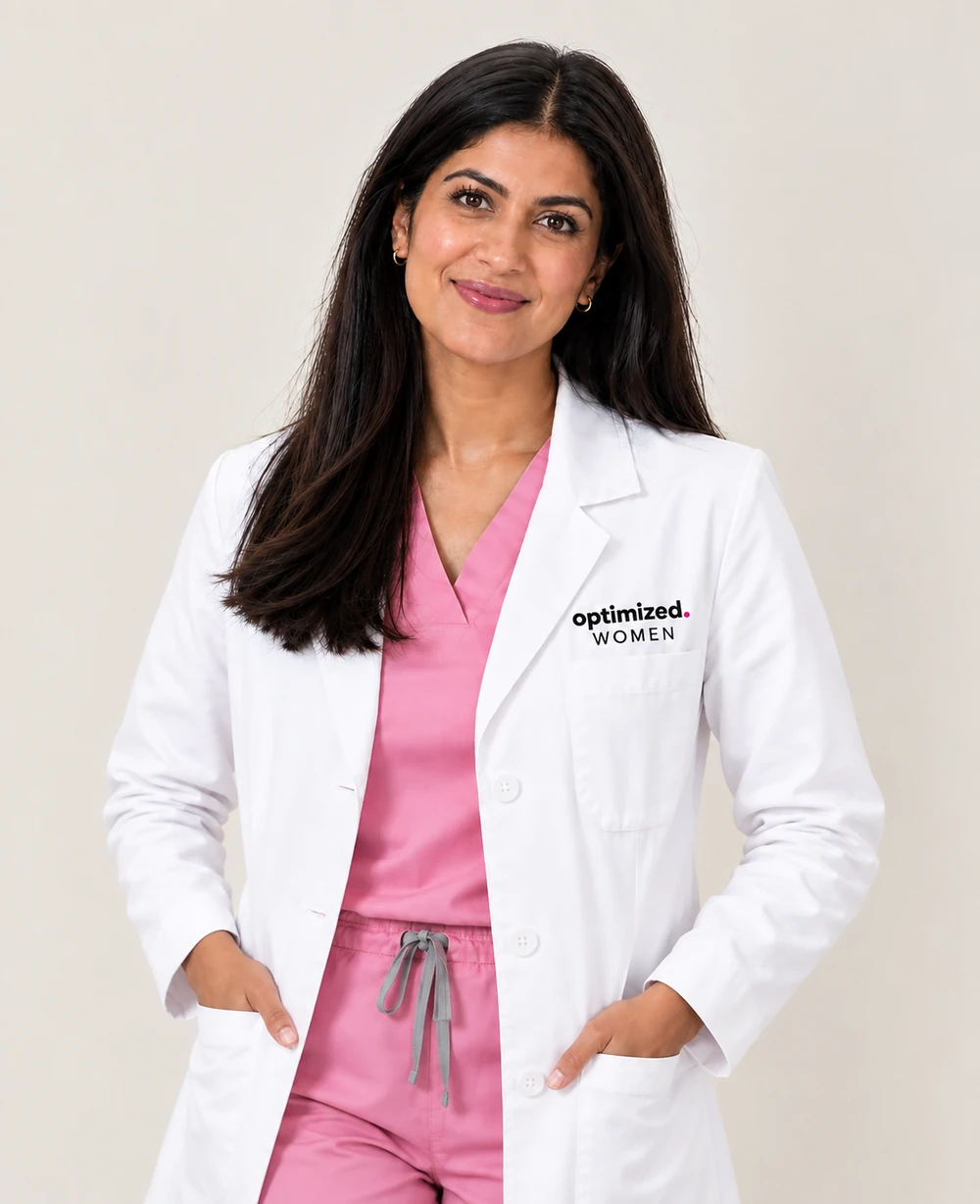 Optimized Women clinician in a branded white coat